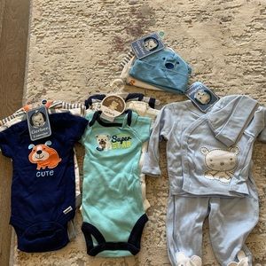 New born onesies and caps total 12 pieces